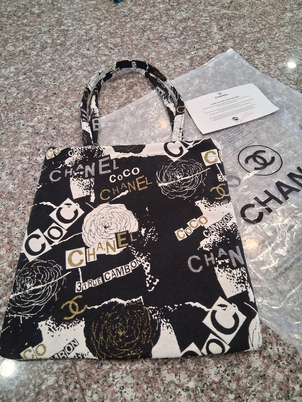 Chanel Uniform  Black & White Canvas Tote Bag with Gold Accents.